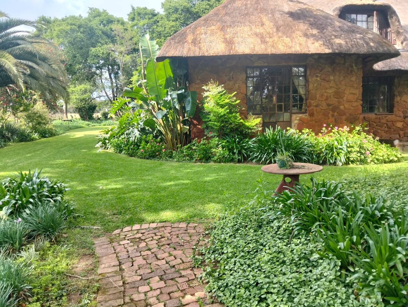The thatched main house